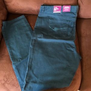 Teal colored 5 pocket zip front jeans size 20